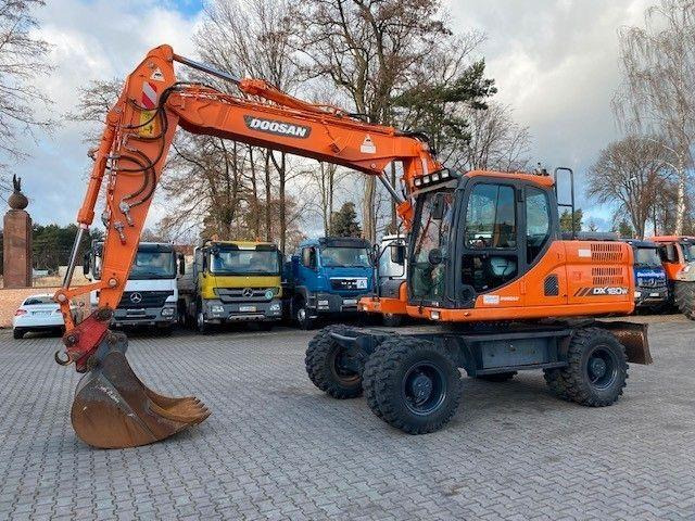 Doosan DX 160 W-3 - حفارة على عجلات: صور 1 Doosan DX 160 W-3 - حفارة على عجلات: صور 1