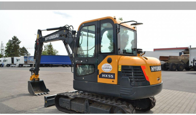 Hyundai HX55 Bager - حفارة مصغرة: صور 1 Hyundai HX55 Bager - حفارة مصغرة: صور 1