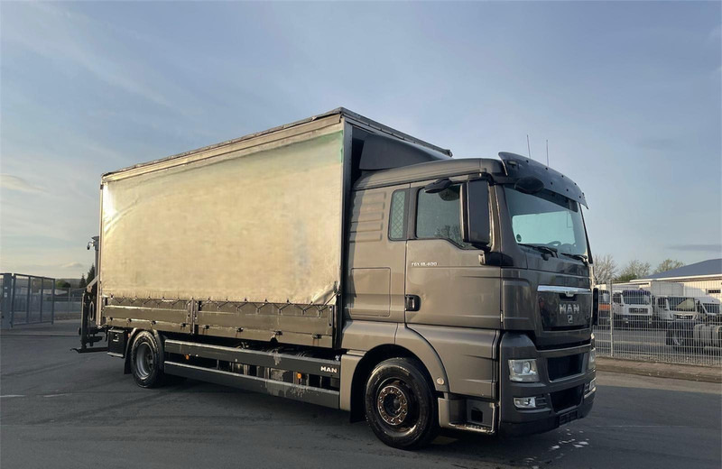 MAN TGX 18.400 Curtain Sider + Crane Palfinger 14002 EH - بصندوق مغلق شاحنة: صور 1 MAN TGX 18.400 Curtain Sider + Crane Palfinger 14002 EH - بصندوق مغلق شاحنة: صور 1