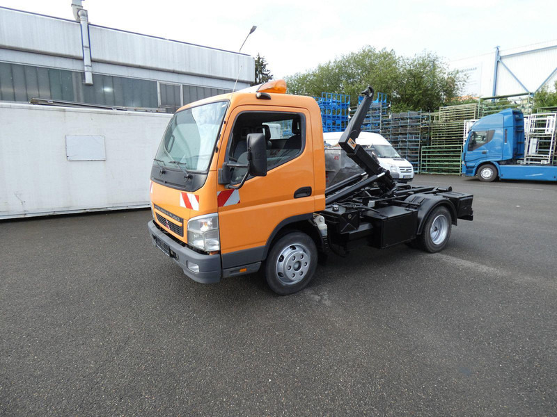 Mitsubishi Canter Fuso Abrollkipper - شاحنات مسطحة, شاحنة كرين: صور 1 Mitsubishi Canter Fuso Abrollkipper - شاحنات مسطحة, شاحنة كرين: صور 1