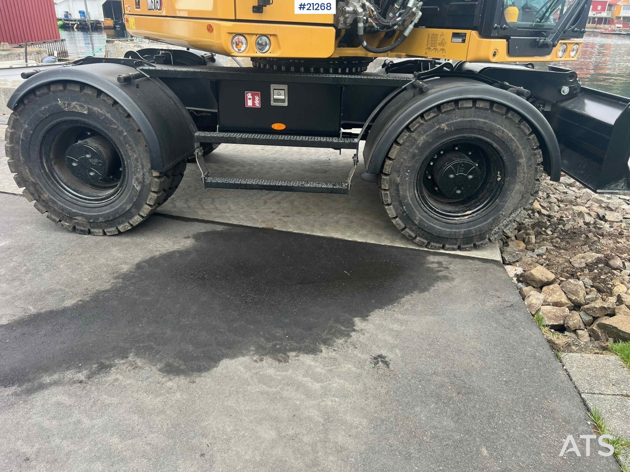 حفارة على عجلات CAT M315: صور 12
