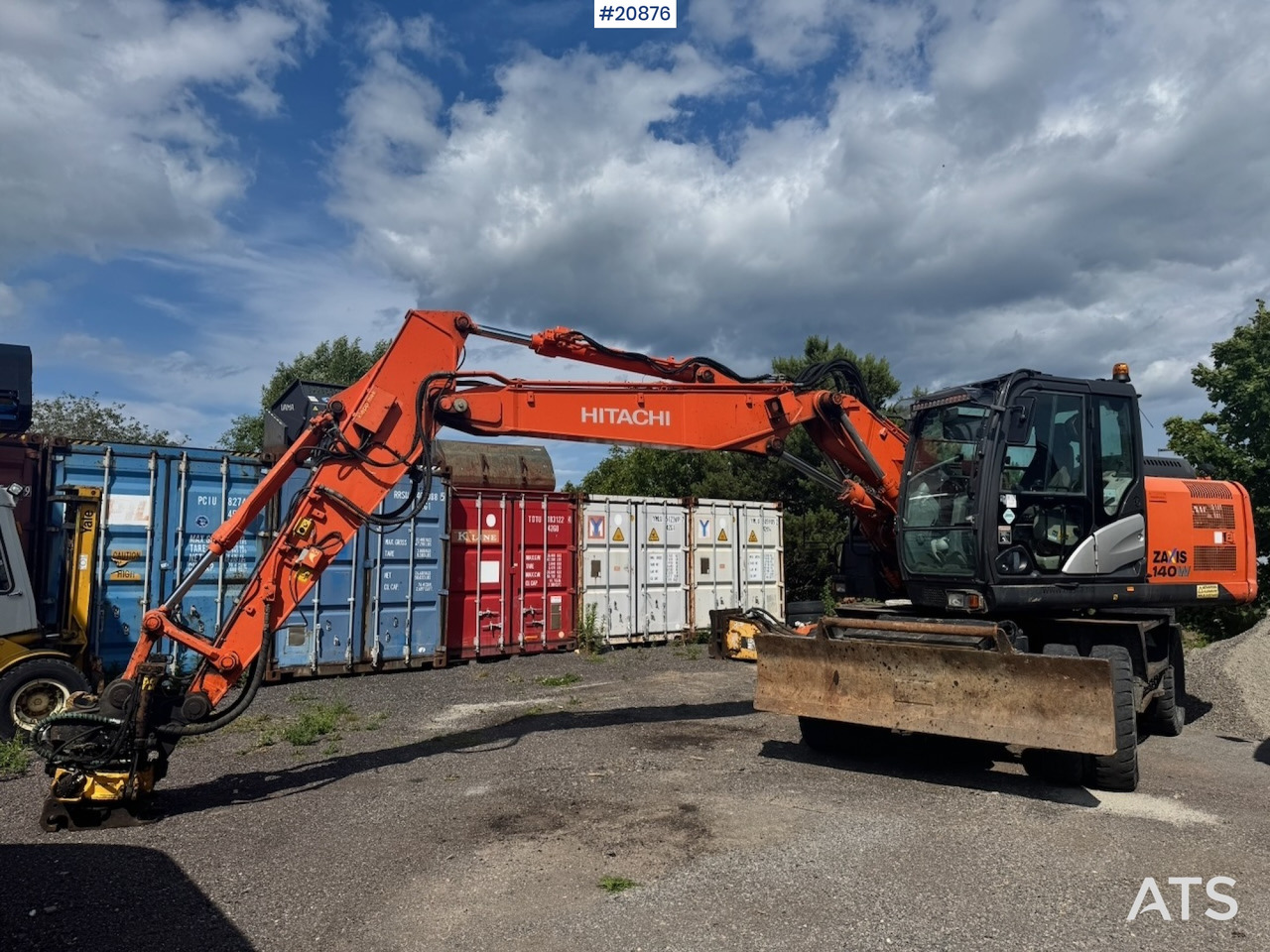 Hitachi ZX140W-5B - حفارة على عجلات: صور 1 Hitachi ZX140W-5B - حفارة على عجلات: صور 1