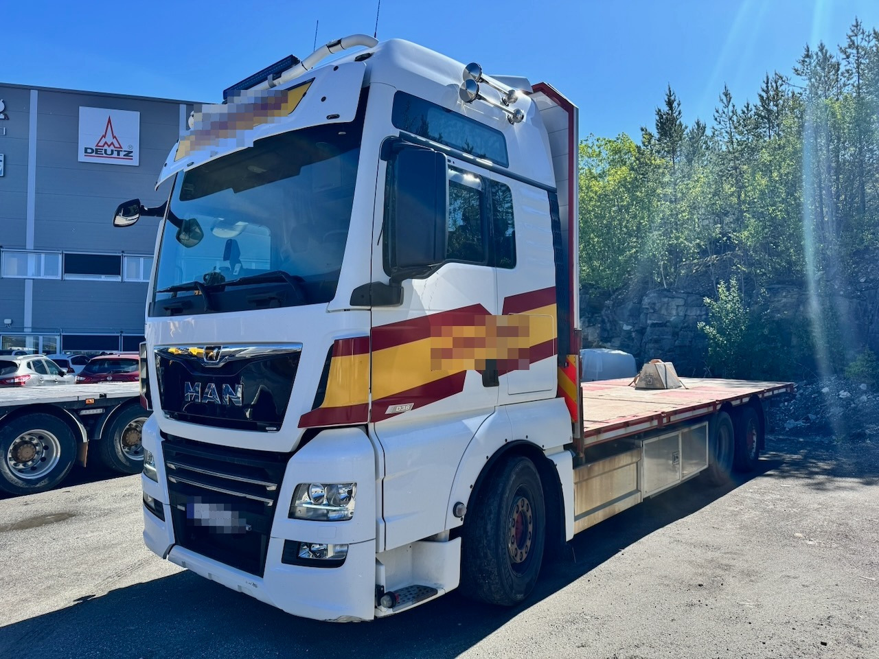 MAN TGX 580 - شاحنات مسطحة: صور 1 MAN TGX 580 - شاحنات مسطحة: صور 1