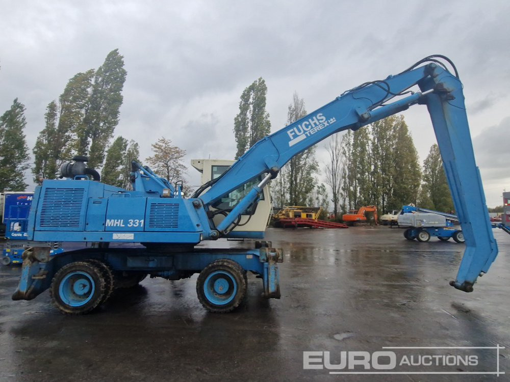 حفارة على عجلات 2004 Fuchs MHL331: صور 6