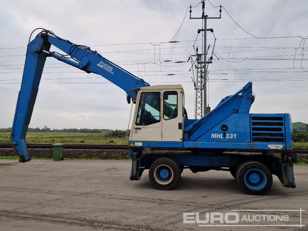 Fuchs MHL331 - حفارة على عجلات: صور 2 Fuchs MHL331 - حفارة على عجلات: صور 2