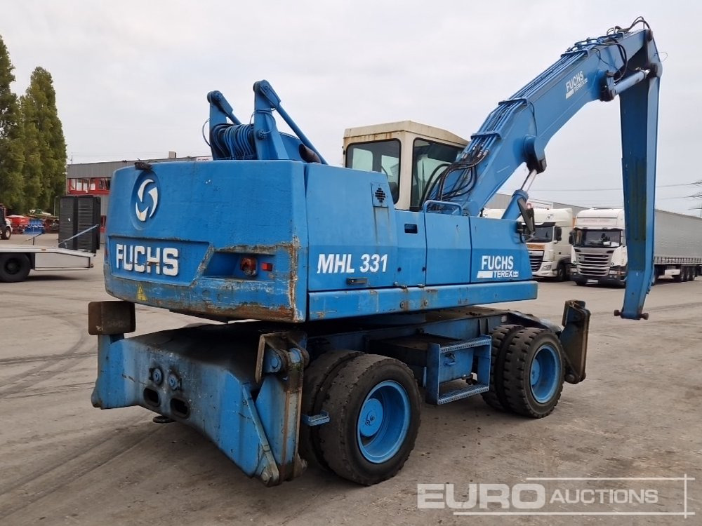 Fuchs MHL331 - حفارة على عجلات: صور 5 Fuchs MHL331 - حفارة على عجلات: صور 5