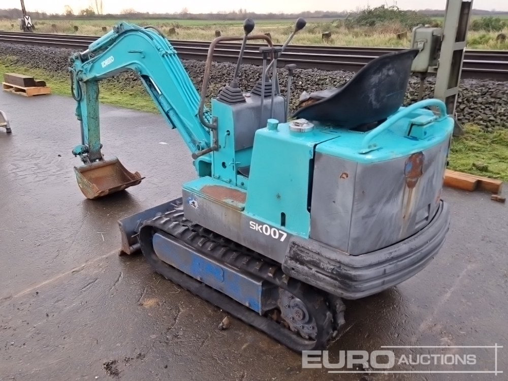 Kobelco SK007 - حفارة مصغرة: صور 3 Kobelco SK007 - حفارة مصغرة: صور 3
