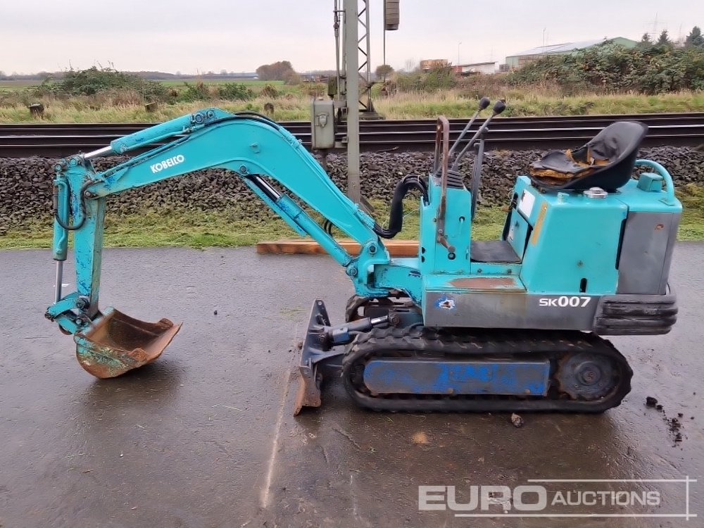 Kobelco SK007 - حفارة مصغرة: صور 2 Kobelco SK007 - حفارة مصغرة: صور 2