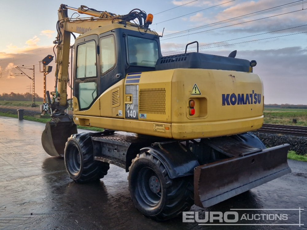 Komatsu PW140-7 - حفارة على عجلات: صور 3 Komatsu PW140-7 - حفارة على عجلات: صور 3