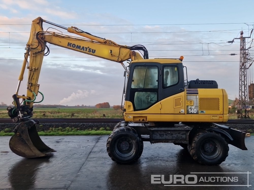 Komatsu PW140-7 - حفارة على عجلات: صور 2 Komatsu PW140-7 - حفارة على عجلات: صور 2