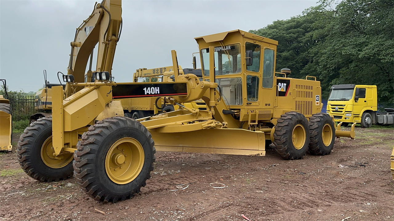 CATERPILLAR 140H motor grader - آلة تسوية الأرض: صور 1 CATERPILLAR 140H motor grader - آلة تسوية الأرض: صور 1
