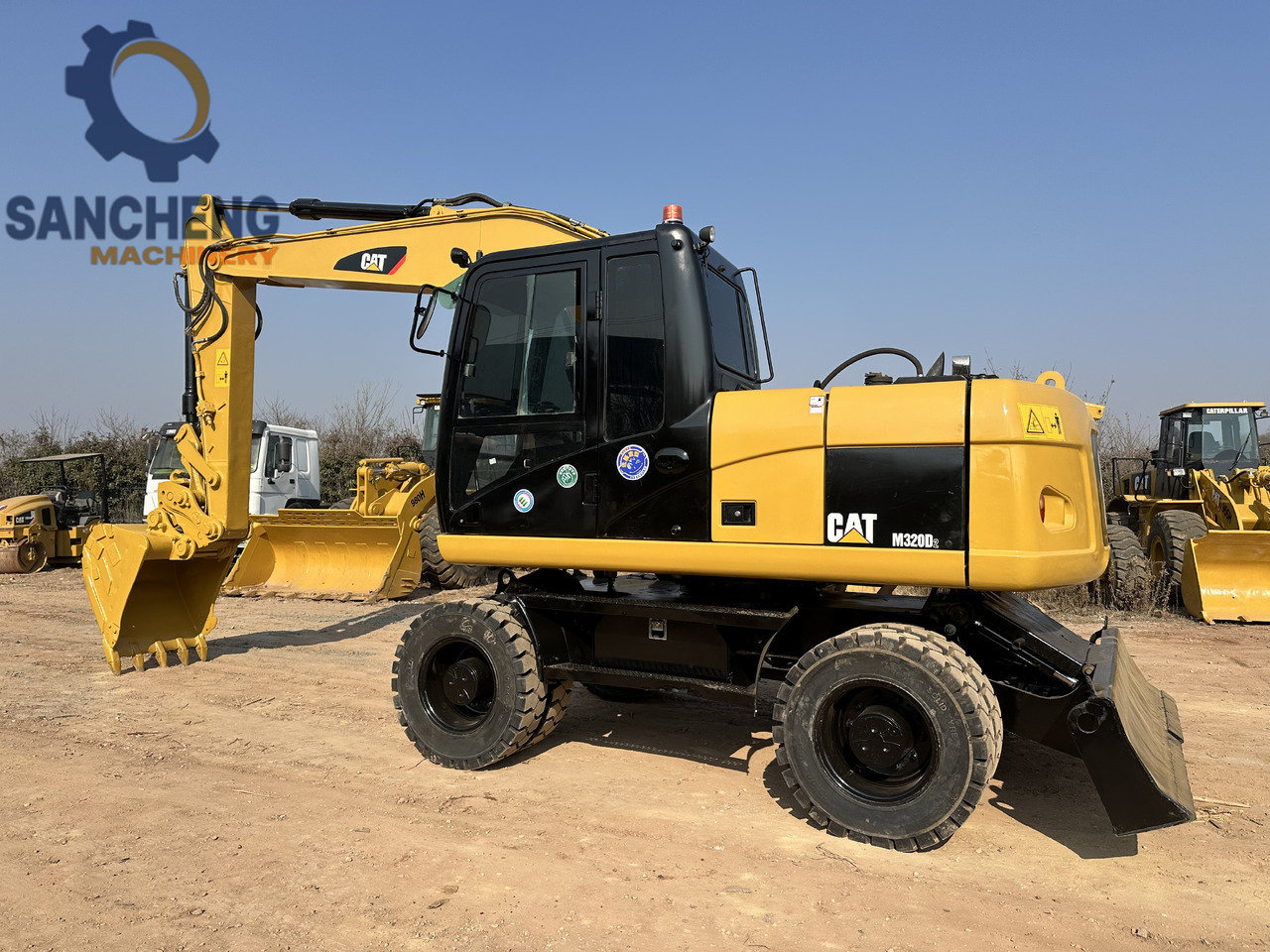CATERPILLAR M320D2 - حفارة على عجلات: صور 1 CATERPILLAR M320D2 - حفارة على عجلات: صور 1