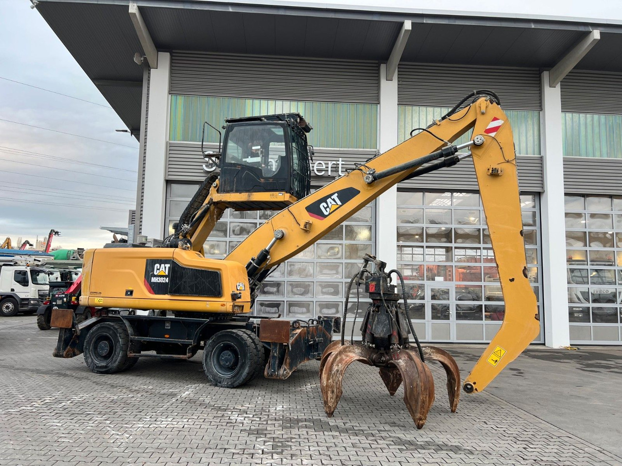 CAT MH3024 / MH 3024 / Greifer / 2018 / 10.735h - حفارة على عجلات: صور 2 CAT MH3024 / MH 3024 / Greifer / 2018 / 10.735h - حفارة على عجلات: صور 2
