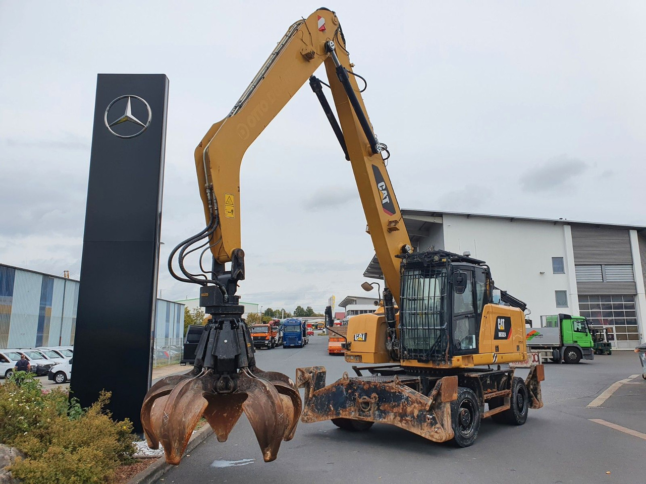 CAT MH3024 / MH 3024 / Greifer / 2018 / 9.424h - حفارة على عجلات: صور 1 CAT MH3024 / MH 3024 / Greifer / 2018 / 9.424h - حفارة على عجلات: صور 1