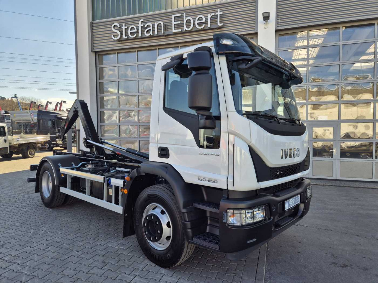 Iveco Eurocargo ML160E25/P HIAB Multilift XR10S4150 - شاحنة ذات الخطاف: صور 1 Iveco Eurocargo ML160E25/P HIAB Multilift XR10S4150 - شاحنة ذات الخطاف: صور 1