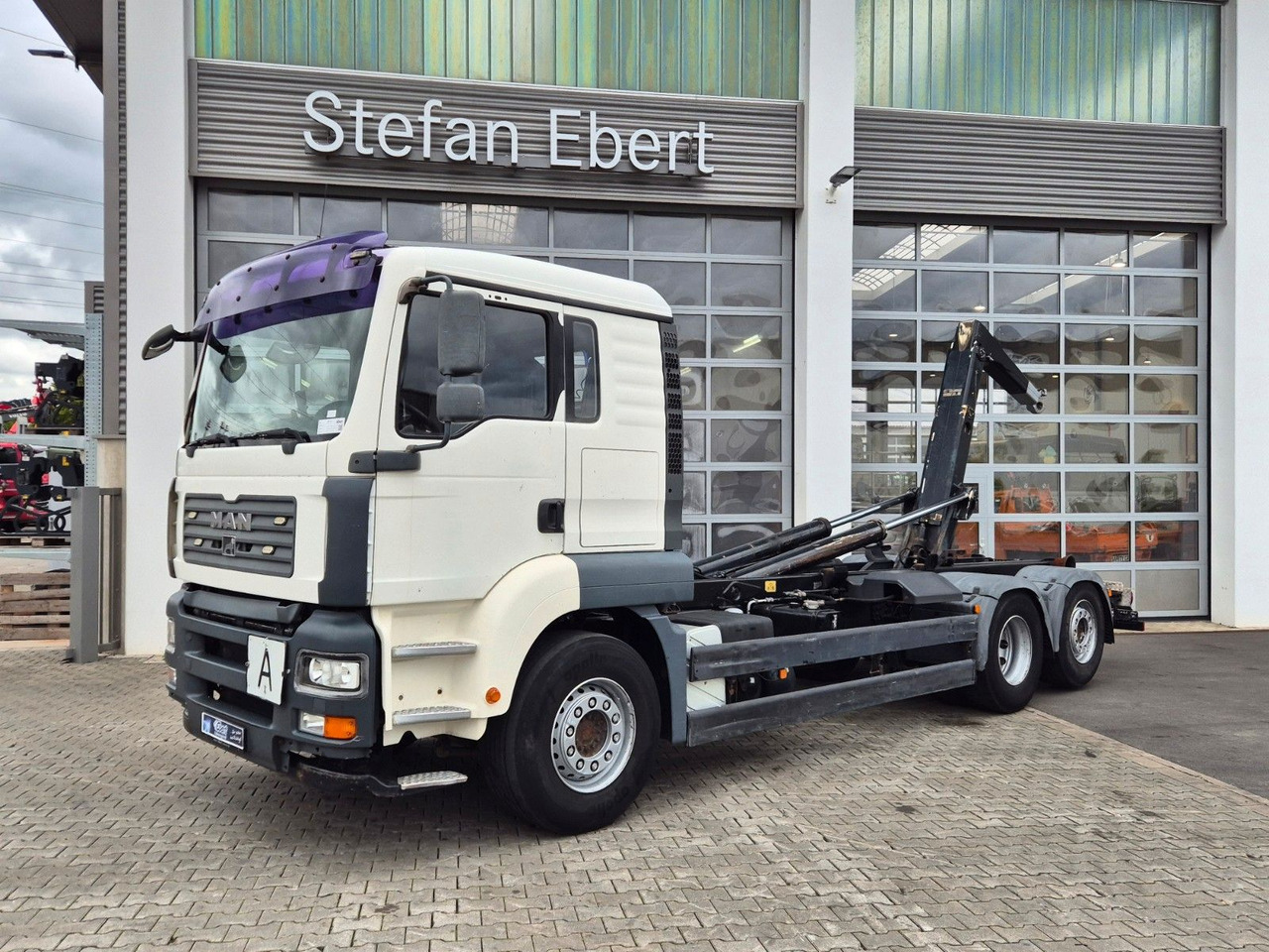 MAN TGA 26.440 6x2-2 BL Meiller RK 20.70 Bett - شاحنة ذات الخطاف: صور 1 MAN TGA 26.440 6x2-2 BL Meiller RK 20.70 Bett - شاحنة ذات الخطاف: صور 1