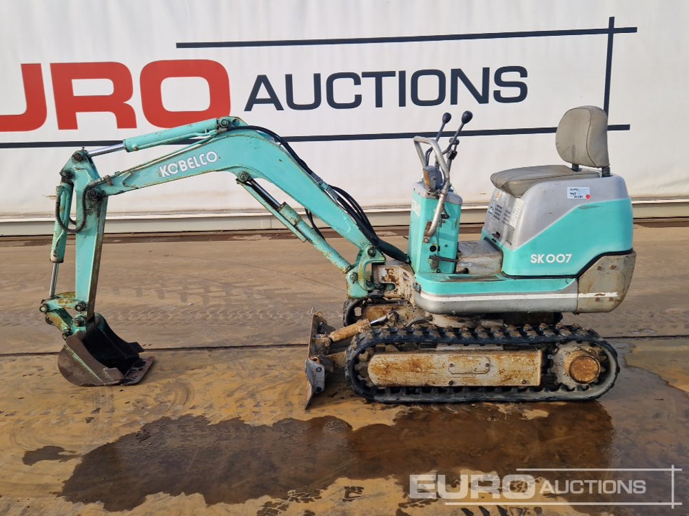 Kobelco SK007-2 - حفارة مصغرة: صور 2 Kobelco SK007-2 - حفارة مصغرة: صور 2