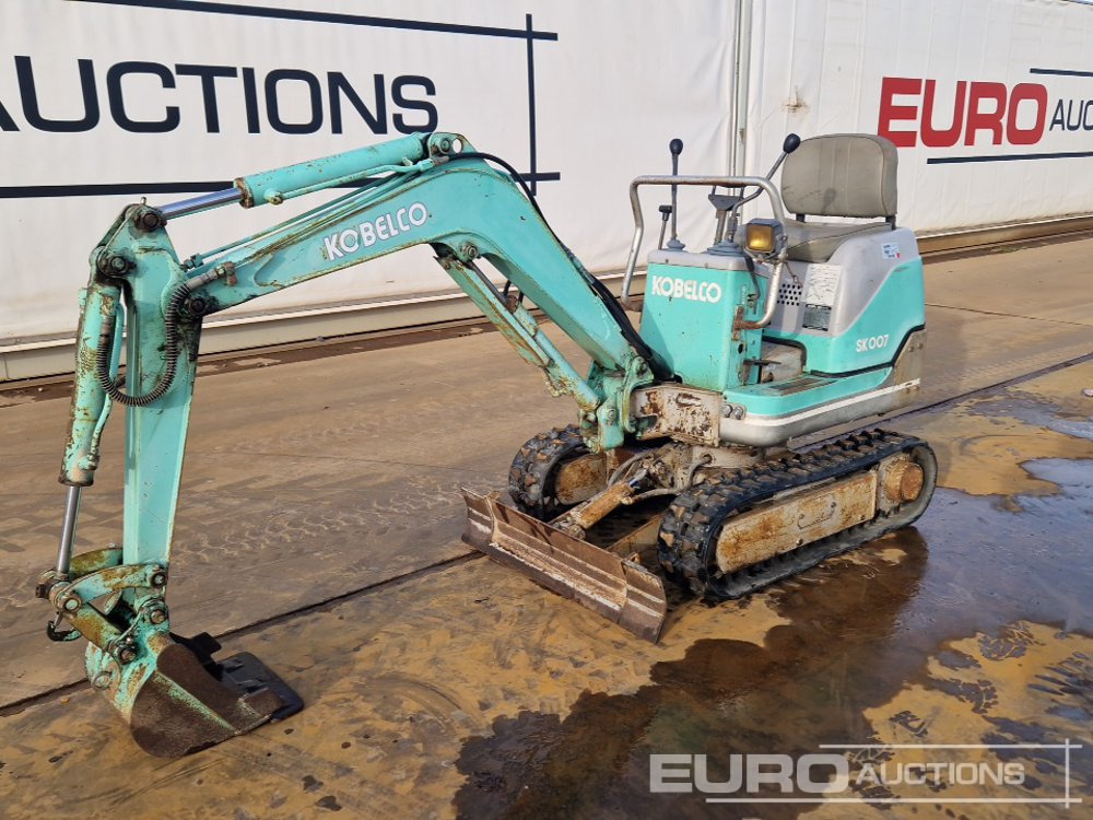 Kobelco SK007-2 - حفارة مصغرة: صور 1 Kobelco SK007-2 - حفارة مصغرة: صور 1