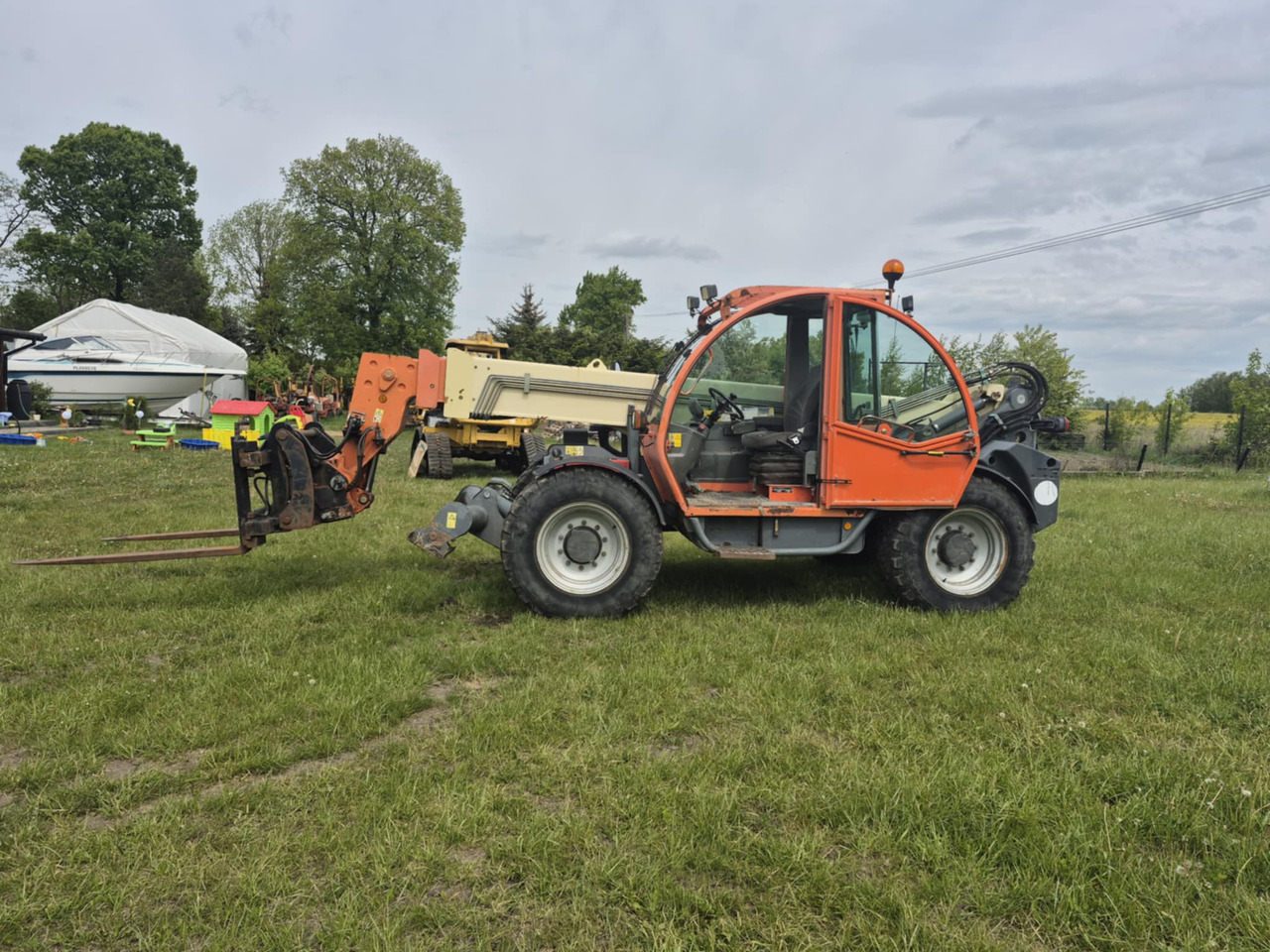 JLG 4013 - جرافة ذات عجلات تلسكوبية: صور 1 JLG 4013 - جرافة ذات عجلات تلسكوبية: صور 1