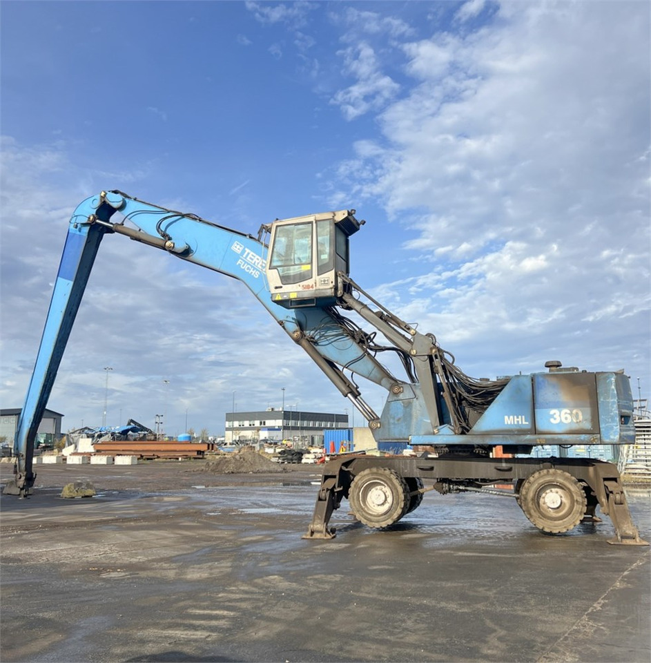 Fuchs MHL 360 - حفارة النقل والشحن: صور 1 Fuchs MHL 360 - حفارة النقل والشحن: صور 1
