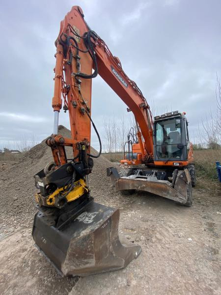 Doosan DX 160W-3 - حفارة على عجلات: صور 4 Doosan DX 160W-3 - حفارة على عجلات: صور 4