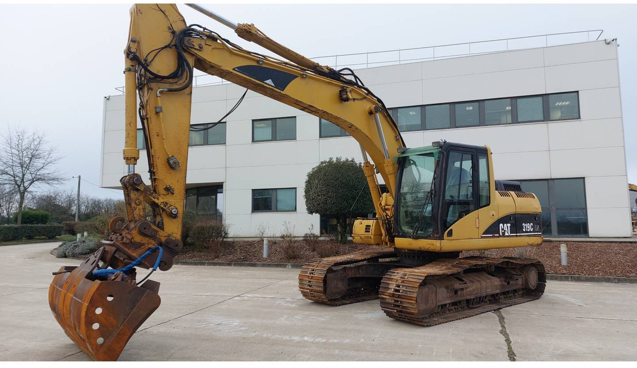 CAT 319C - حفارات زحافة: صور 1 CAT 319C - حفارات زحافة: صور 1