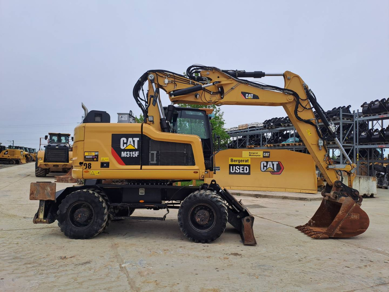 CAT M315F IVC - حفارة على عجلات: صور 1 CAT M315F IVC - حفارة على عجلات: صور 1