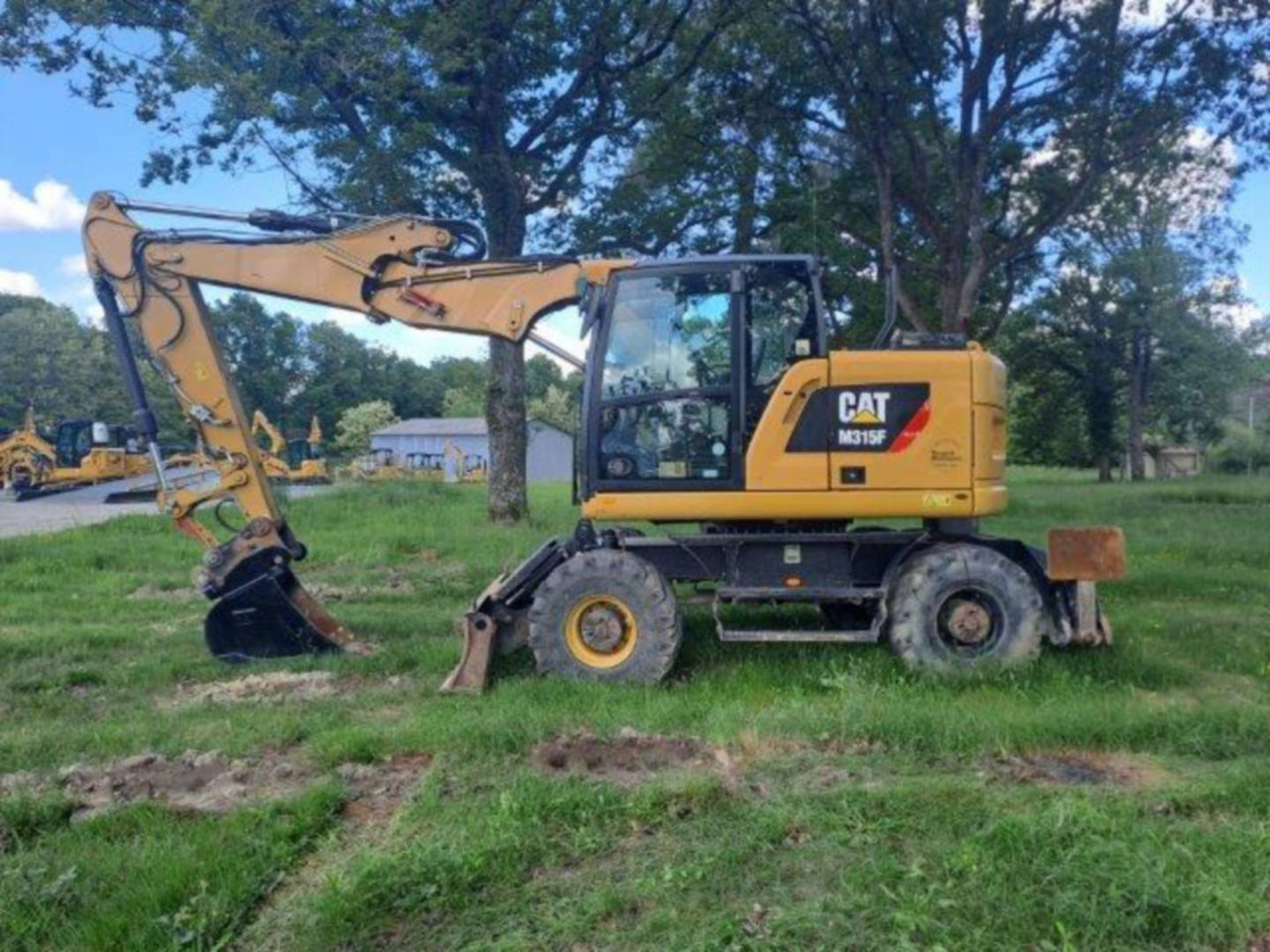 حفارة على عجلات CAT M315F IVC: صور 12