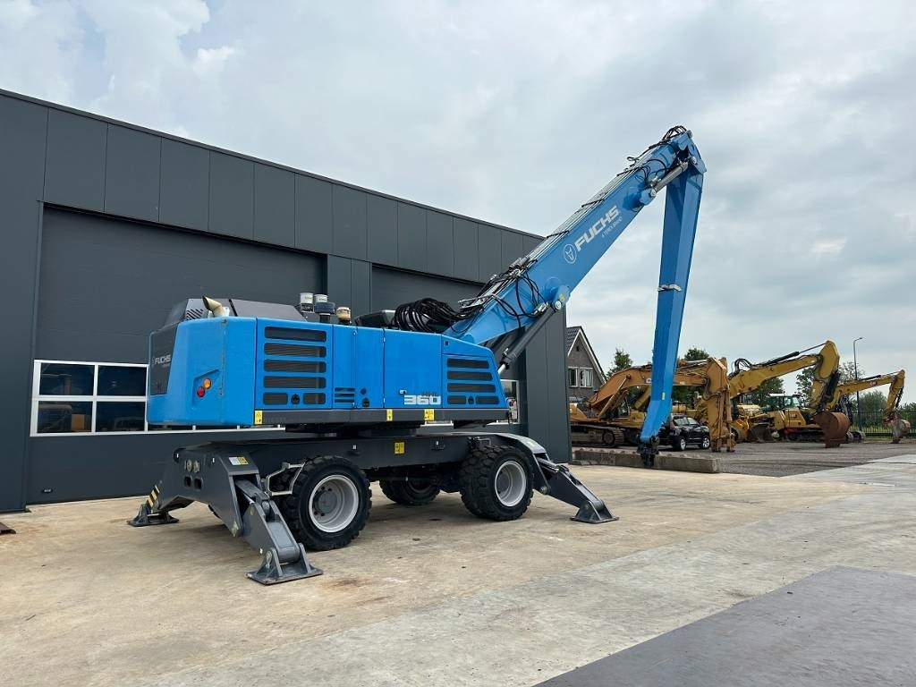 Fuchs MHL 360 F - حفارة النقل والشحن: صور 3 Fuchs MHL 360 F - حفارة النقل والشحن: صور 3