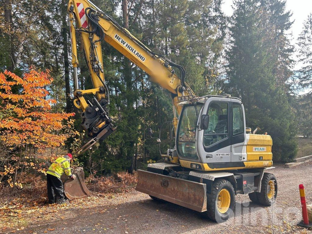 New Holland MH 4.6 - حفارة على عجلات: صور 1 New Holland MH 4.6 - حفارة على عجلات: صور 1