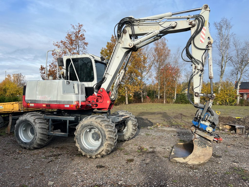 Takeuchi TB175W - حفارة على عجلات: صور 5 Takeuchi TB175W - حفارة على عجلات: صور 5