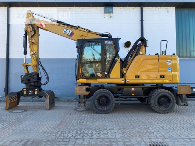 Cat M314MH - حفارة النقل والشحن: صور 1 Cat M314MH - حفارة النقل والشحن: صور 1