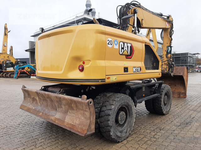 Cat M318-07A - حفارة على عجلات: صور 5 Cat M318-07A - حفارة على عجلات: صور 5