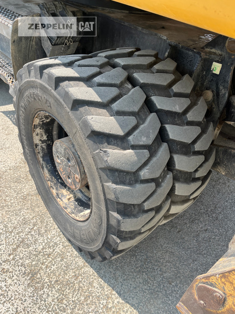 حفارة على عجلات Cat M318D: صور 11