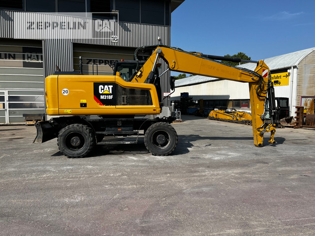 Cat M318F - حفارة على عجلات: صور 5 Cat M318F - حفارة على عجلات: صور 5